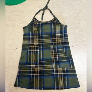 super cute plaid dress. ties around the neck has pockets